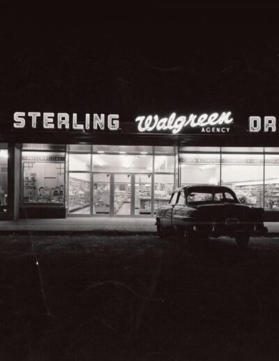 A Black and White Photograph of the Front of the Original Sterling Drug Storefront