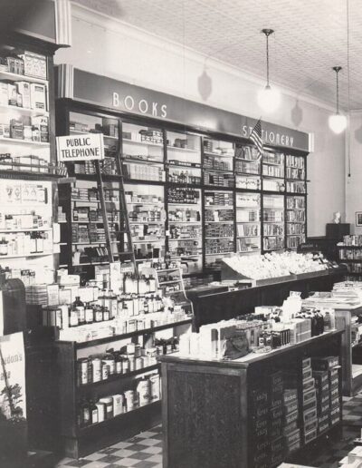 A Black and White Photograph of the Interior of the Original Sterling Drug Store