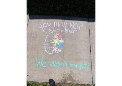 Brain and flower chalk drawing you may not remember we won't forget!