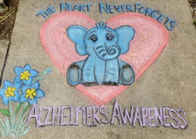 Elephant in a heart chalk drawing the heart never forgets alzheimer's awareness