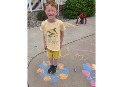 youth with flower chalk drawing