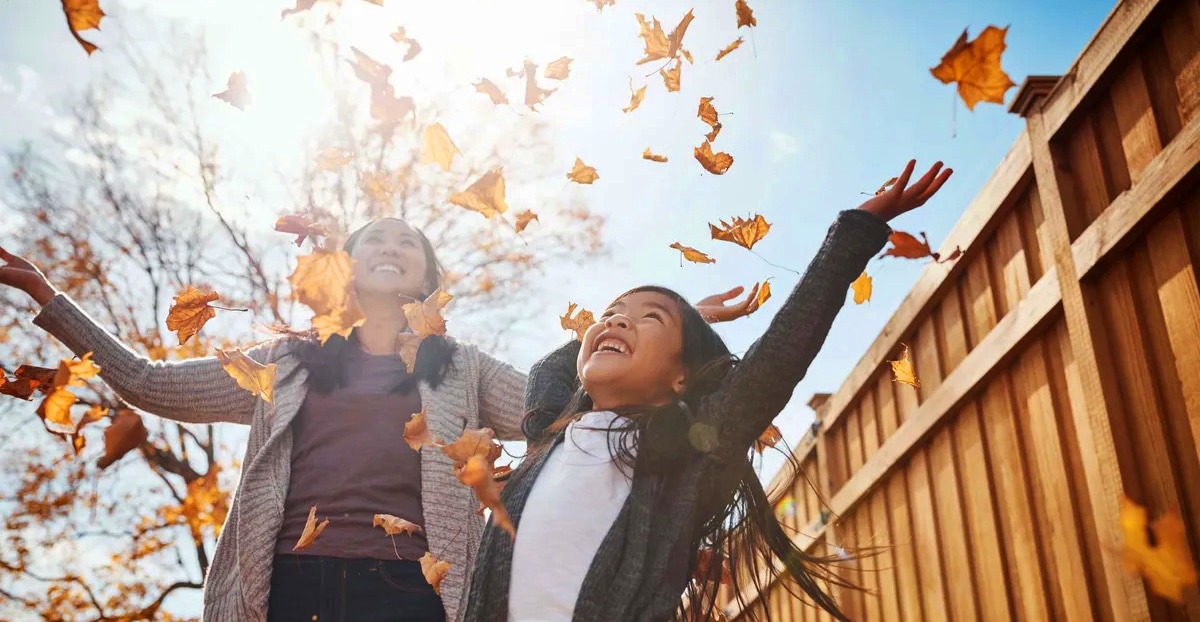 Playing in the leaves fall image